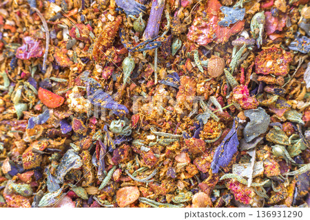 Abstract textured natural bright orange colorful copy space background. Millet, oak, different grains small particles, fish and parrot food. Abstract textured natural bright orange colorful copy space background. Millet, oak, different grains small particles, fish and parrot food. 136931290