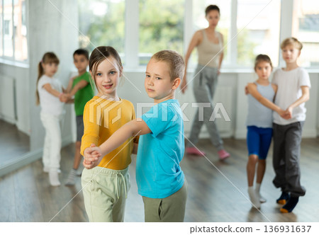Group of children dancing couple waltz dance Group of children dancing couple waltz dance 136931637