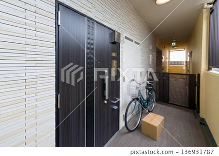 Personal belongings left in the common areas of the apartment building 136931787