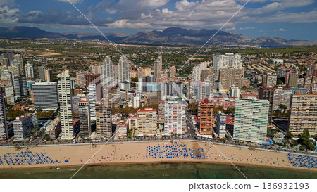 Aerial view of Benidorm beachfront skyline with high rise buildings and sandy beach Spain 136932193
