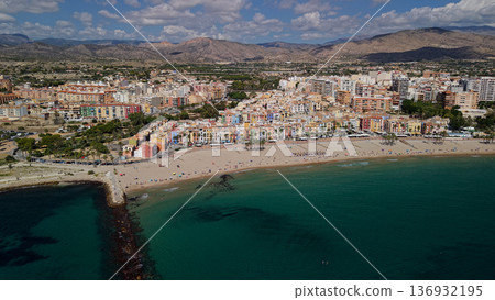 Aerial view of Villajoyosa beach and colorful old town houses along Mediterranean coastline Spain Aerial view of Villajoyosa beach and colorful old town houses along Mediterranean coastline Spain 136932195