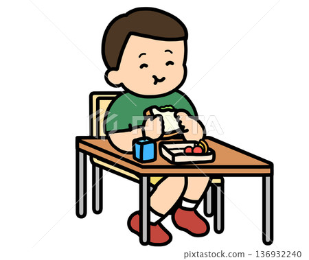 Lunchtime: Asian boy eating a sandwich at his desk Lunchtime: Asian boy eating a sandwich at his desk 136932240