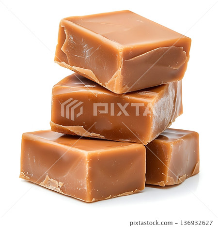 Delicious Caramel Candies Stacked Three Layers on White Background for Sweet Treats and Desserts 136932627