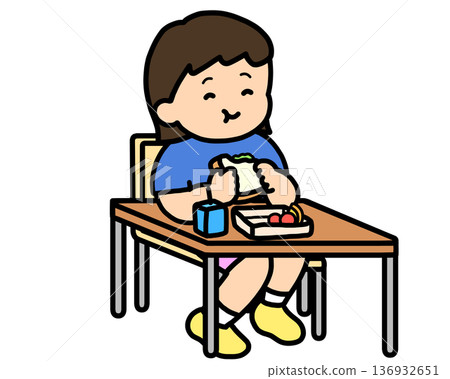 Lunchtime: Asian girl eating a sandwich at her desk Lunchtime: Asian girl eating a sandwich at her desk 136932651