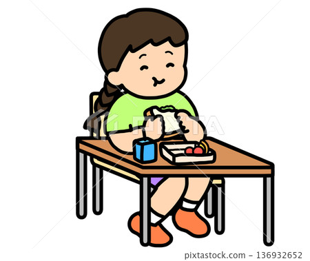 Lunchtime: Asian girl eating a sandwich at her desk 136932652