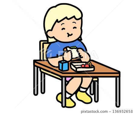 Lunchtime: Blonde girl eating a sandwich at her desk 136932658