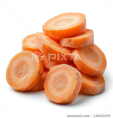Freshly Cut Orange Carrot Slices Piled High on a Bright White Background for Culinary Use 136932870