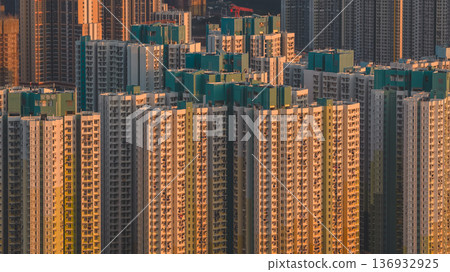 Jan 11 2026 On Tai Estate residential towers under evening sunset glow Jan 11 2026 On Tai Estate residential towers under evening sunset glow 136932925