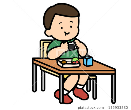 Lunchtime: Asian boy eating rice balls at his desk Lunchtime: Asian boy eating rice balls at his desk 136933280
