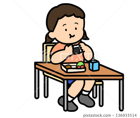 Lunchtime: Asian girl eating rice balls at her desk Lunchtime: Asian girl eating rice balls at her desk 136933514