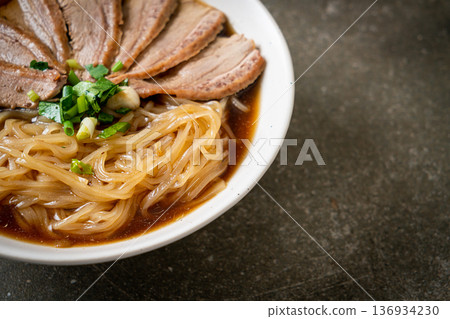 duck noodles with stewed duck soup 136934230