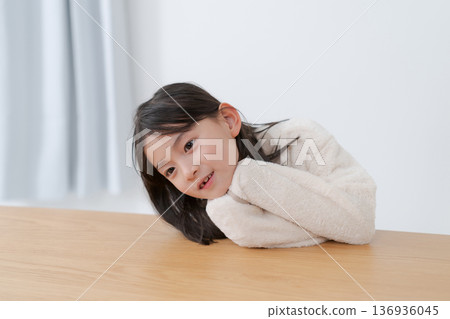 Girl relaxing in pajamas 136936045