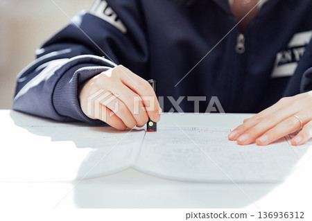 A scene where a marriage registration is stamped A scene where a marriage registration is stamped 136936312