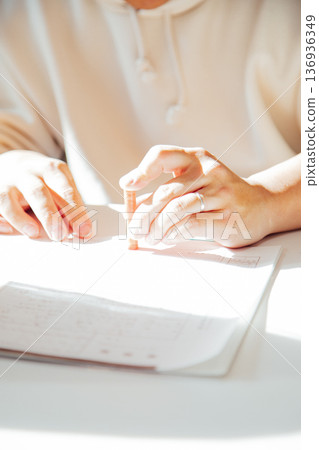 A scene where a marriage registration is stamped A scene where a marriage registration is stamped 136936349
