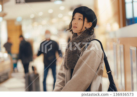 Woman shopping at the mall Woman shopping at the mall 136936573