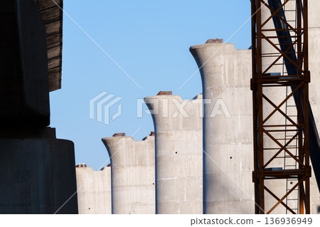 Concrete pier under construction with blue sky background 136936949
