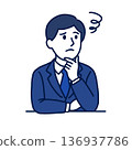A male employee worried about how to proceed with work 136937786