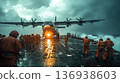 Military transport aircraft landing on aircraft carrier in stormy weather 136938603