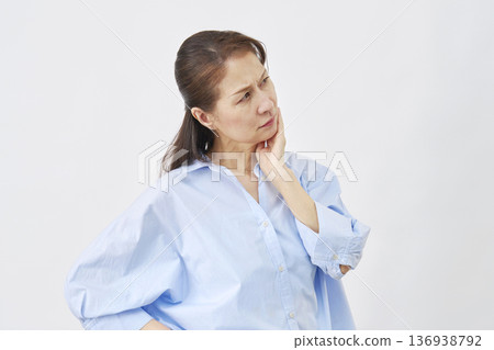 Woman suffering from white background 136938792