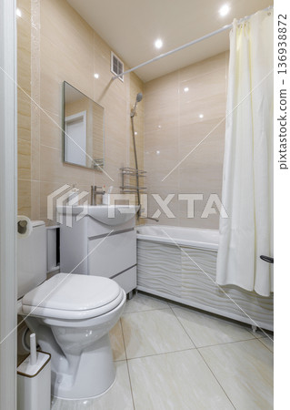 Modern Neutral Bathroom Interior with Bathtub and Vanity Modern Neutral Bathroom Interior with Bathtub and Vanity 136938872