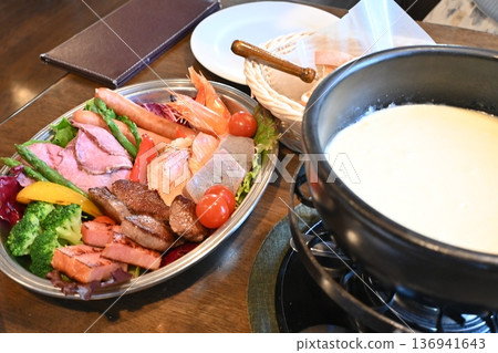 Blissful Cheese Fondue: Colorful Grilled Ingredients and Melted Cheese 136941643