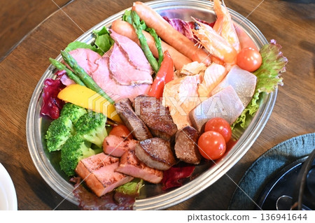 Gorgeous colors: Assorted grilled ingredients to decorate your cheese fondue 136941644