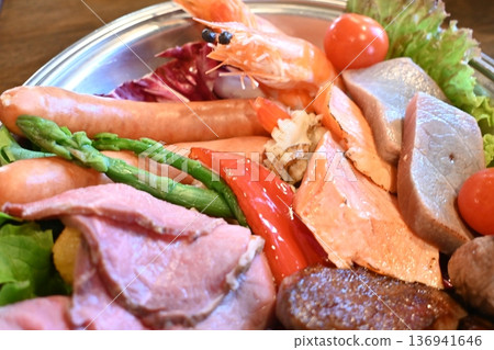 Colorful and carefully selected ingredients: Grill plate for cheese fondue Colorful and carefully selected ingredients: Grill plate for cheese fondue 136941646
