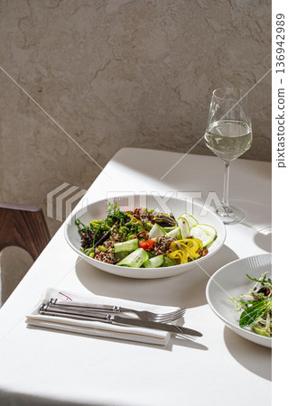 Vegetable quinoa bowl with white wine Vegetable quinoa bowl with white wine 136942989