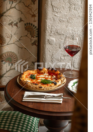 Margherita pizza with basil and red wine Margherita pizza with basil and red wine 136942994