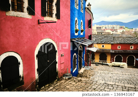 Colorful Historic Buildings Along Cobblestone Street Colorful Historic Buildings Along Cobblestone Street 136943167