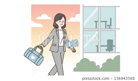 A woman leaving work on time, with a spring in her step 136943568