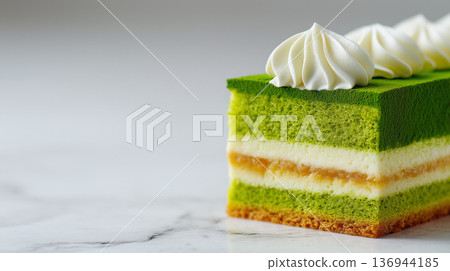 Slice of Traditional Green Princess Cake 136944185