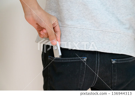 People who carry hardware wallets in their pockets 136944313