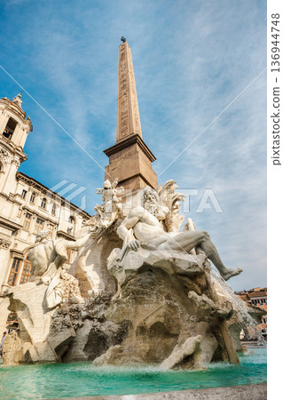 Fountain of the Four Rivers with obelisk at Piazza Navona in Rome Italy Fountain of the Four Rivers with obelisk at Piazza Navona in Rome Italy 136944748
