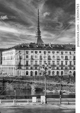 Mole Antonelliana towering over Turin, Italy, on a sunny day 136944763