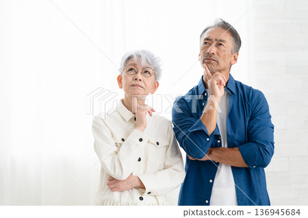 Woman and man standing side by side Lifestyle image Woman and man standing side by side Lifestyle image 136945684