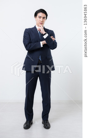 Standing handsome middle-aged businessman, full body, thinking, worrying 136945863