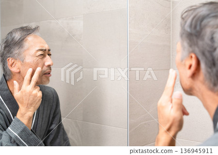 Senior man doing skin care Beauty image 136945911