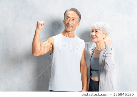 Senior men and women in training wear Sports image 136946180