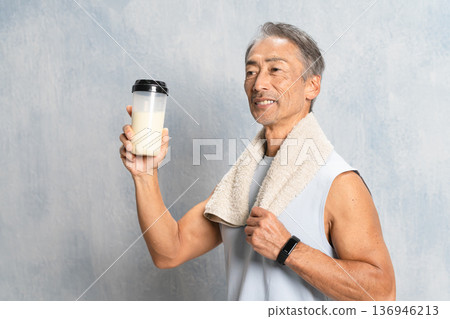 Senior man drinking protein, sports image 136946213