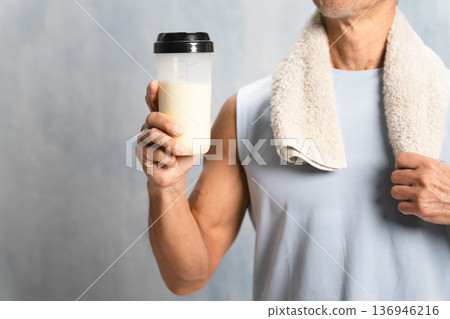 Senior man drinking protein, sports image Senior man drinking protein, sports image 136946216
