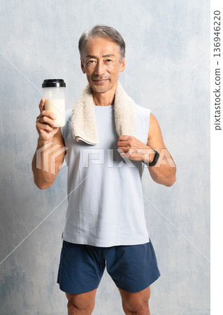 Senior man drinking protein, sports image Senior man drinking protein, sports image 136946220