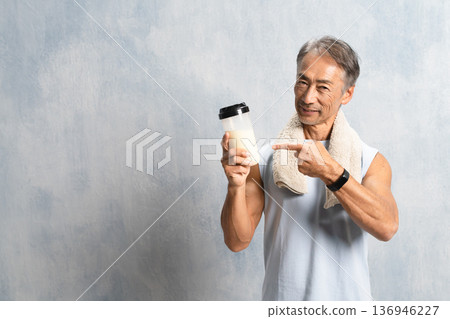 Senior man drinking protein, sports image 136946227