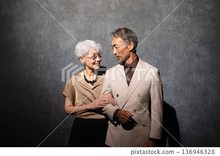 Senior men and women in informal clothing Lifestyle image Senior men and women in informal clothing Lifestyle image 136946328