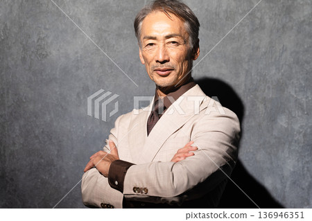 Senior man wearing a double-breasted suit Lifestyle image 136946351