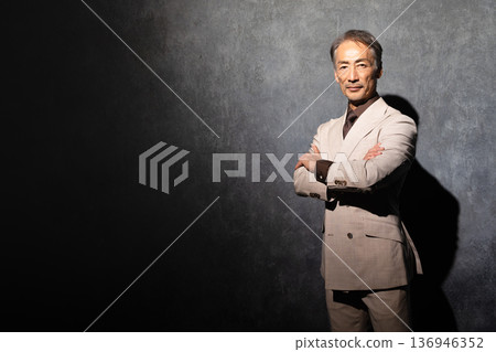 Senior man wearing a double-breasted suit Lifestyle image 136946352