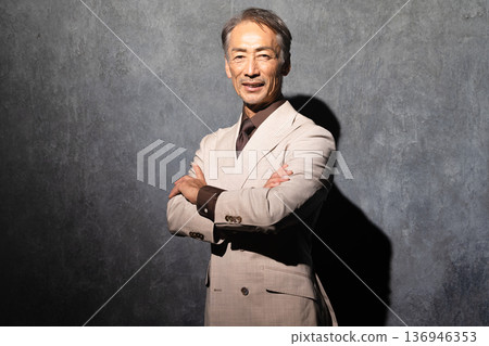 Senior man wearing a double-breasted suit Lifestyle image 136946353