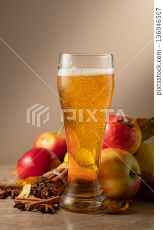 Apple cider with apples, cinnamon, and anise. Apple cider with apples, cinnamon, and anise. 136946507