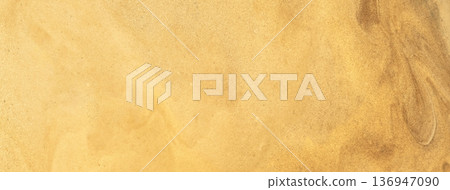 Light golden abstract fluid art background with soft marble texture and gold acrylic pour painting style, macro Light golden abstract fluid art background with soft marble texture and gold acrylic pour painting style, macro 136947090