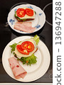 Sandwiches with Ham, Cheese, Tomatoes and Lettuce. 136947288